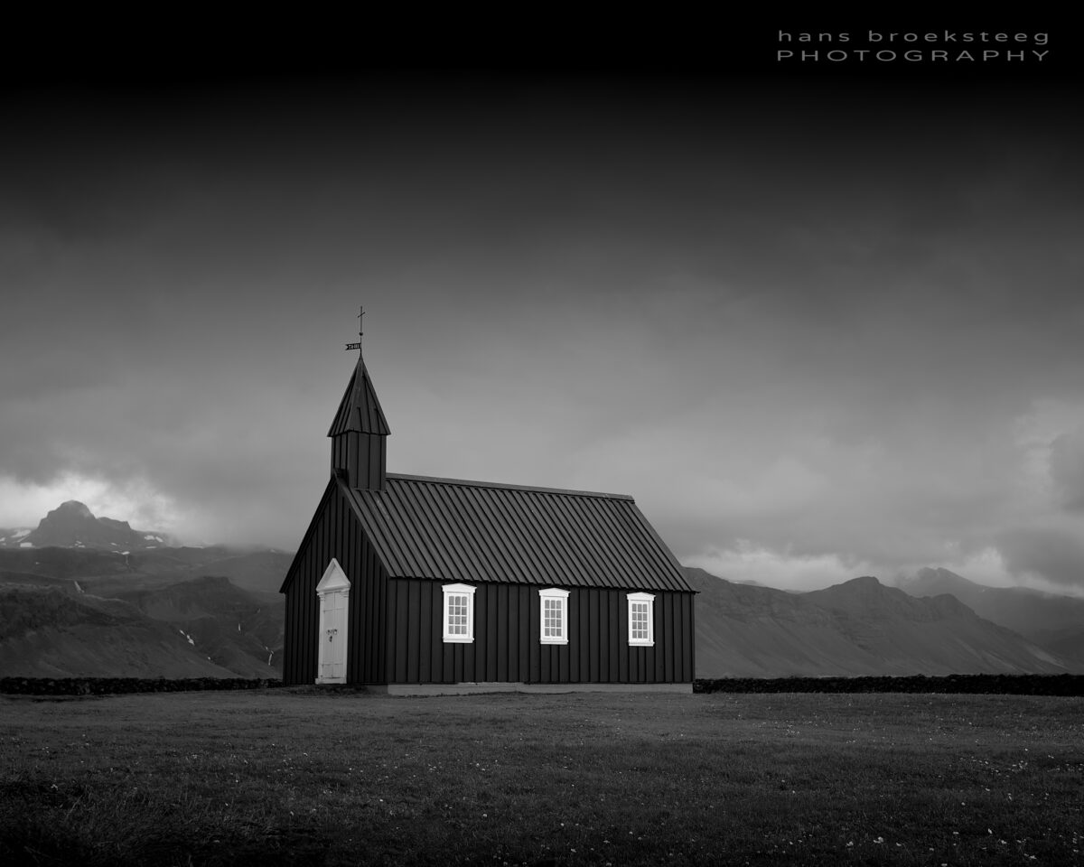 Búðakirkja, possibly the most photographed church in Iceland. This wooden, black church is beautifully situated close to the sea and with a mountainous backdrop.